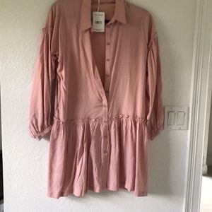 Free People peach rose color dress.